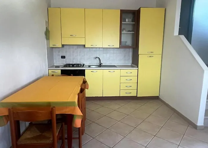 Сasa de vacaciones Fior Di Loto Porto Corallo